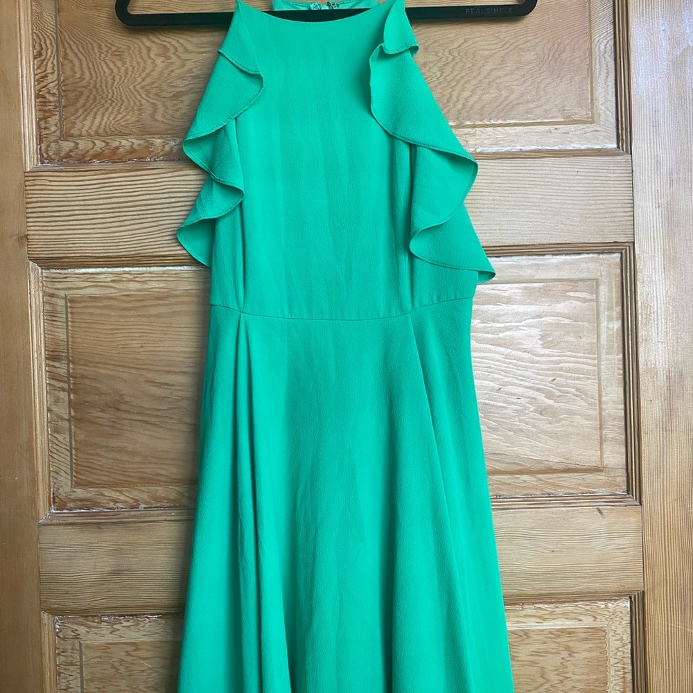 Green ruffle cocktail dress